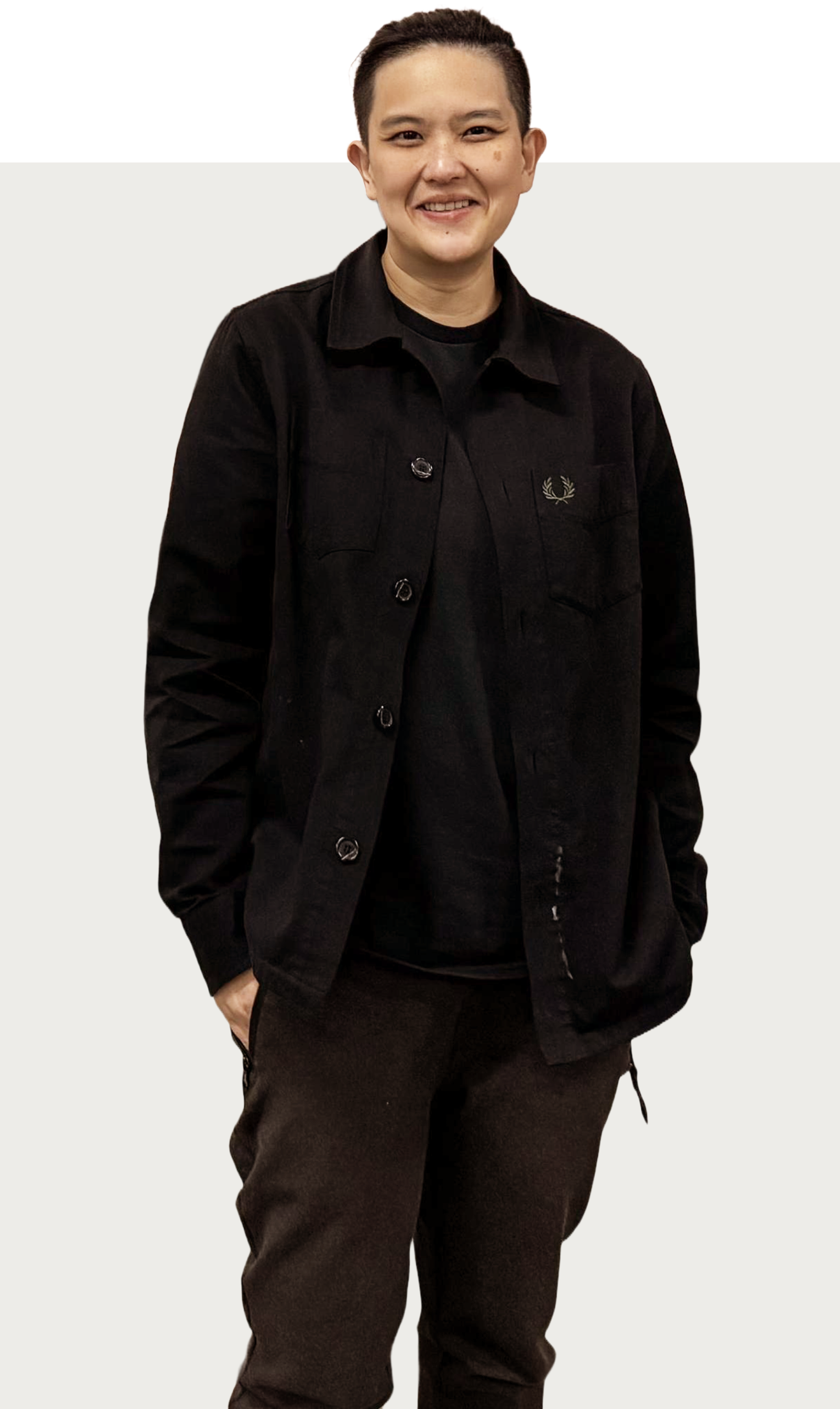Chi Sum Ngai on a simple color-blocked background